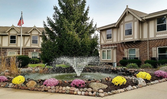 Image of Mequon Office Park showing front of building with fountain with Office space for lease in Mequon